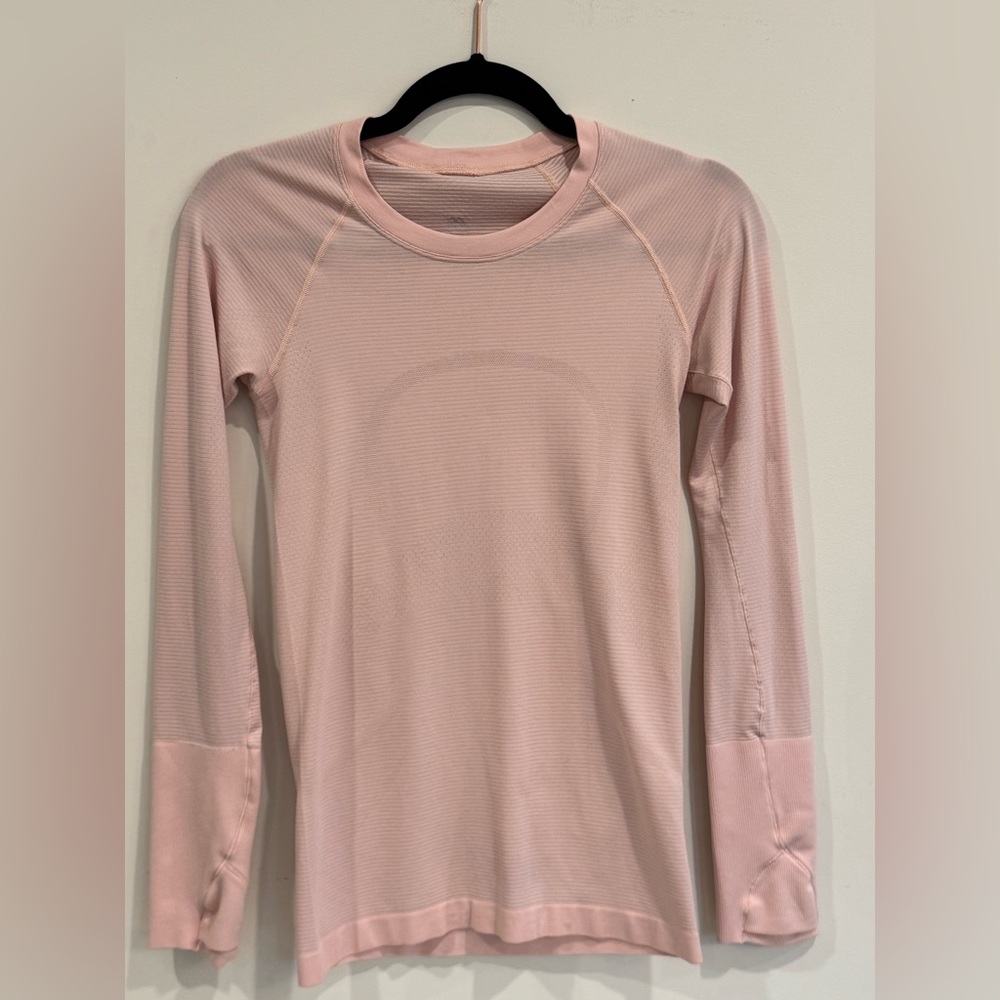 Lululemon pink long sleeve swiftly.